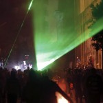 Protesters opposing Egyptian President Mursi shout slogans and shine laser pointers at riot police during clashes in Cairo